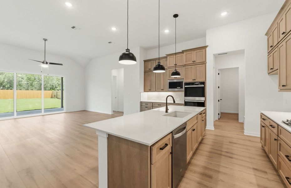 Furnished interior view inside a new home in 6 Creeks, Kyle (Image 8).