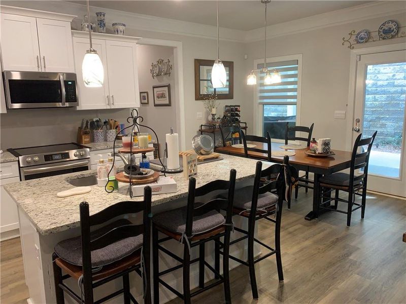 Furnished interior view inside a new home in Holiday Pines, Buford (Image 4).
