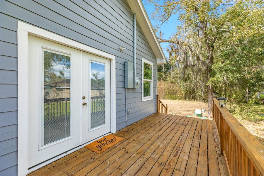 Enjoy peaceful mornings sipping coffee on the spacious deck.
