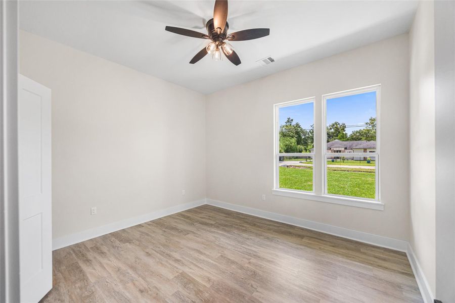 1st of Three Spacious Secondary Bedrooms.