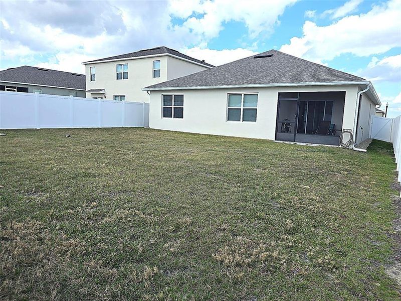 Exterior details and patio area of a home in Wind Meadows South, Bartow (Image 32).
