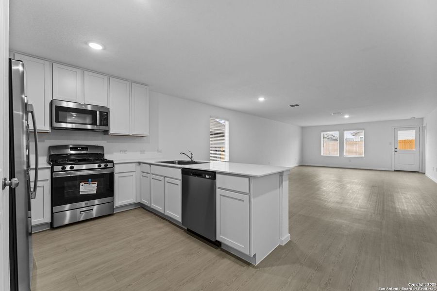 Furnished interior view inside a new home in , Floresville (Image 6).