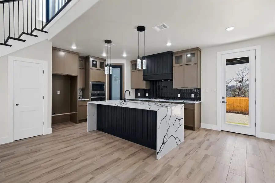 Furnished interior view inside a new home in , Fort Worth (Image 7).
