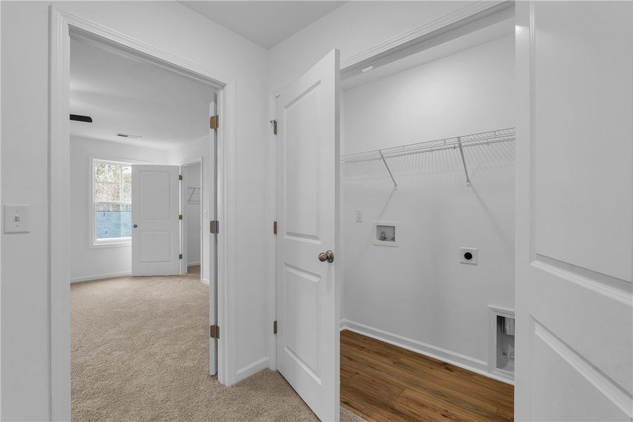 This dedicated laundry area offers practical conve This dedicated laundry area offers practical conve