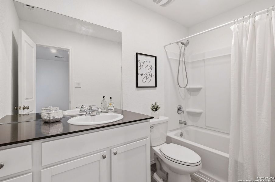 Furnished interior view inside a new home in Aston Park: Wellton Collection, San Antonio (Image 5).