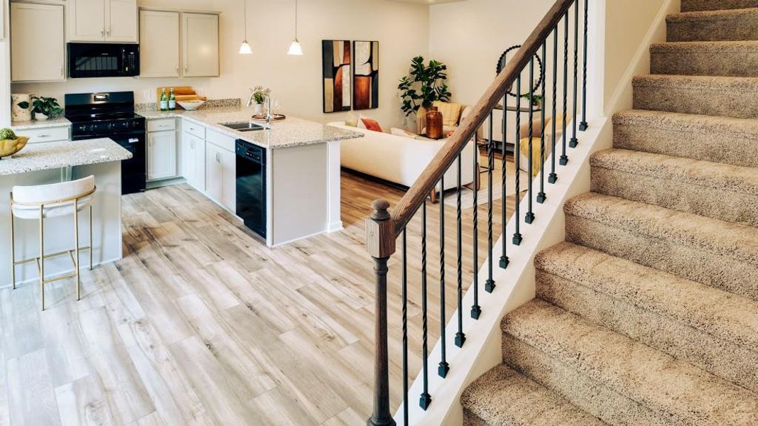 Furnished interior view inside a new home in Sterling At The Villages, Calhoun (Image 7).