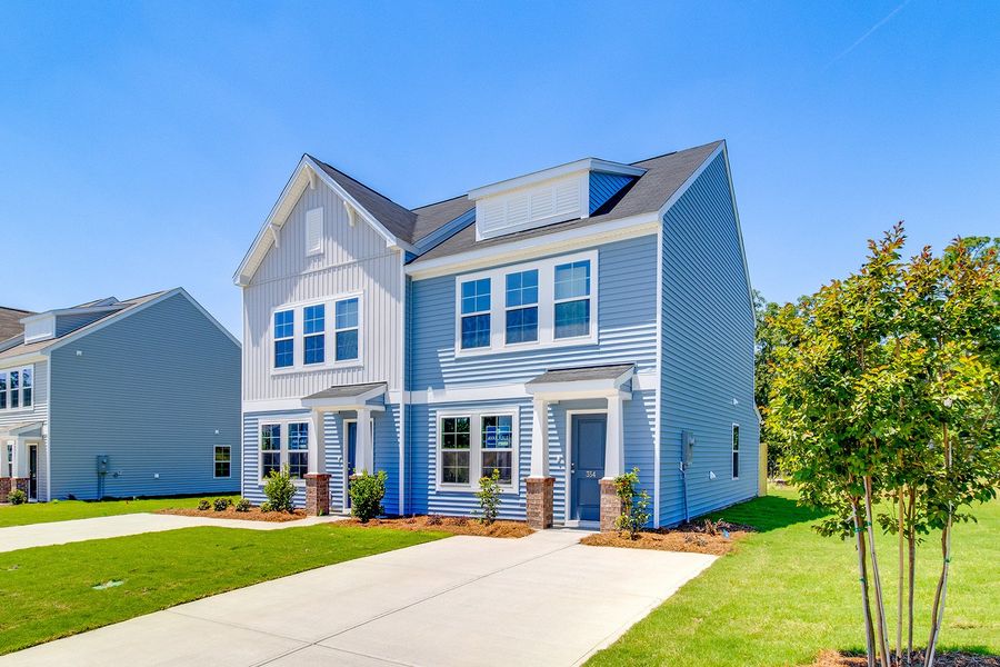 Front exterior of a new home in Padgett Commons, Hopkins, SC, highlighting curb appeal (Image 19).