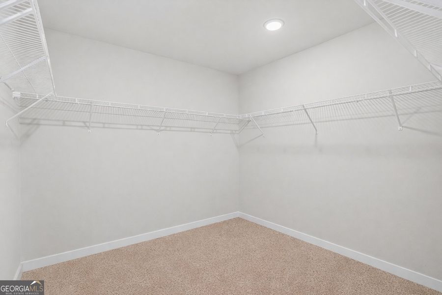 Spacious, unfurnished interior of a new home in The Fairways at Mirror Lake, Villa Rica (Image 32). Spacious, unfurnished interior of a new home in The Fairways at Mirror Lake, Villa Rica (Image 32).