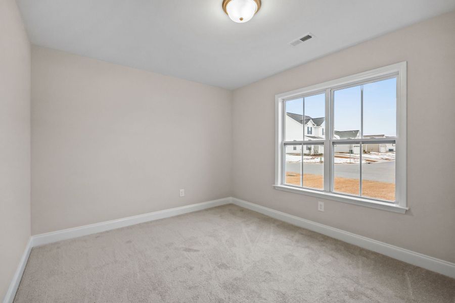 Spacious, unfurnished interior of a new home in Davenport Farms, Winterville (Image 38).