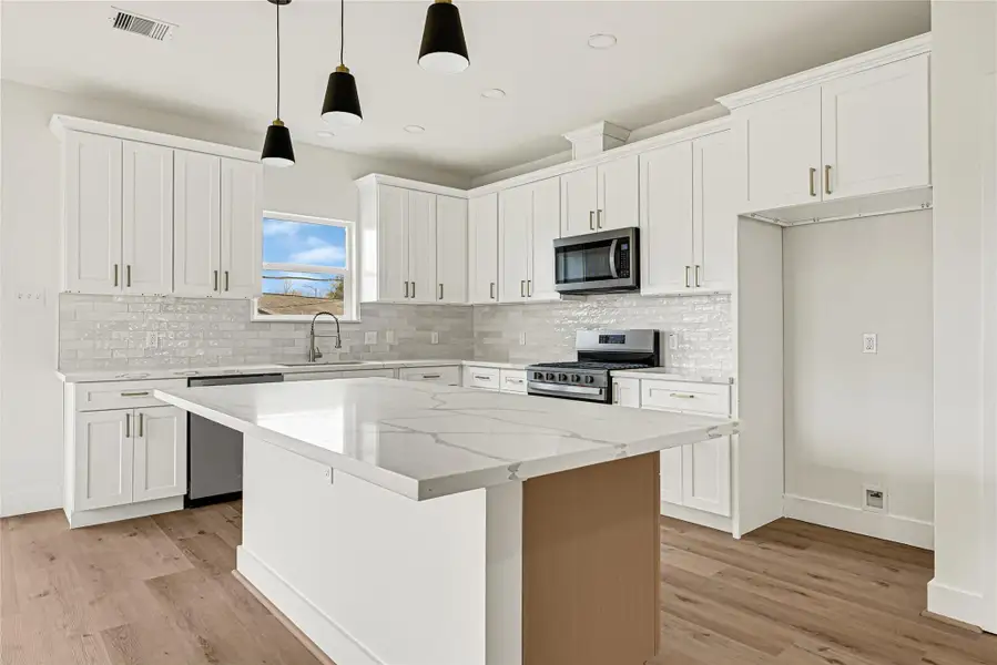 Modern kitchen with central island Modern kitchen with central island