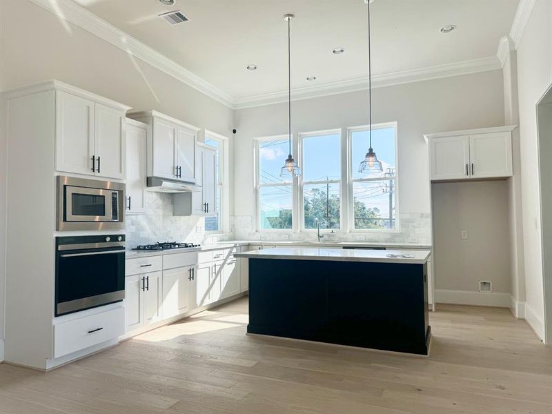 bright open kitchen with unobstructed views and tons of lights