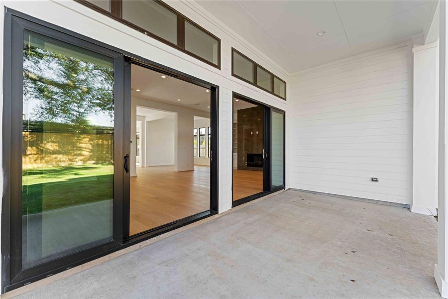 Exterior details and patio area of a home in , Houston (Image 3).