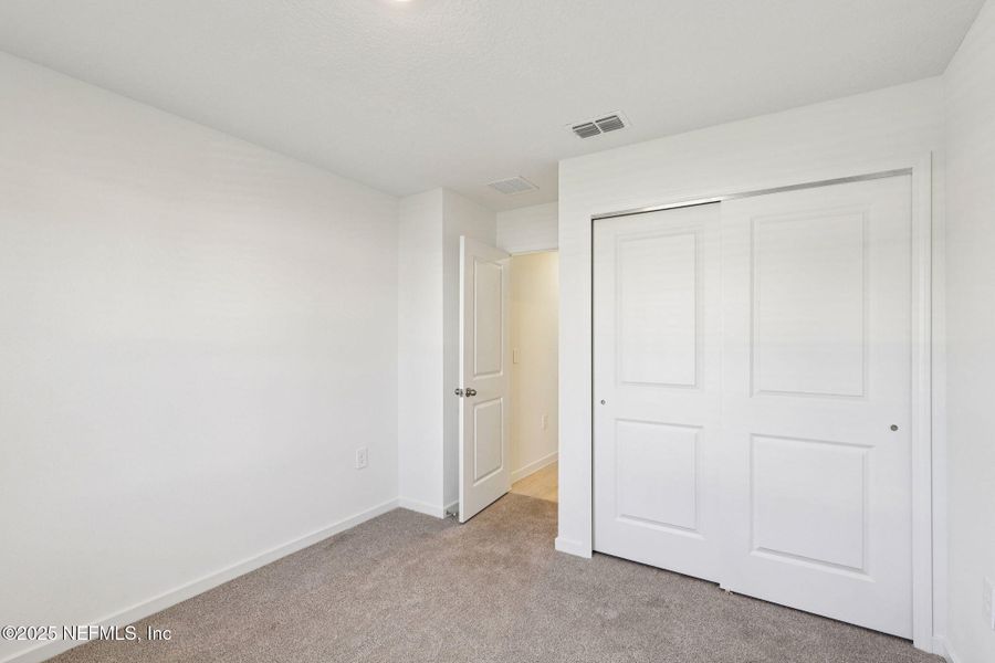 Spacious, unfurnished interior of a new home in Cypress Meadows - Signature Series, Jacksonville (Image 18).