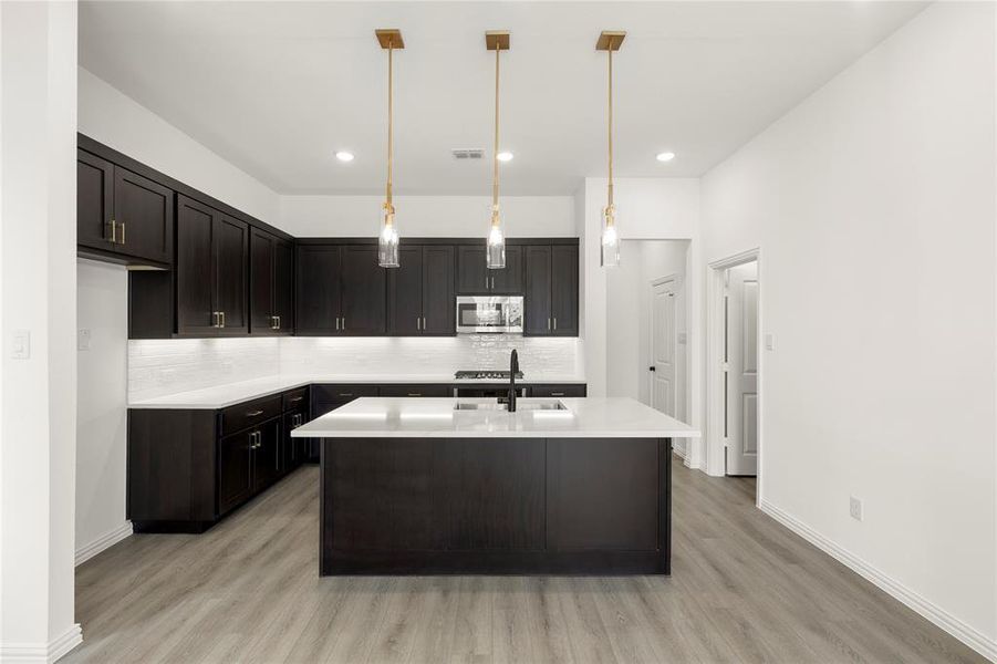 Furnished interior view inside a new home in Collin Creek, Plano (Image 8).