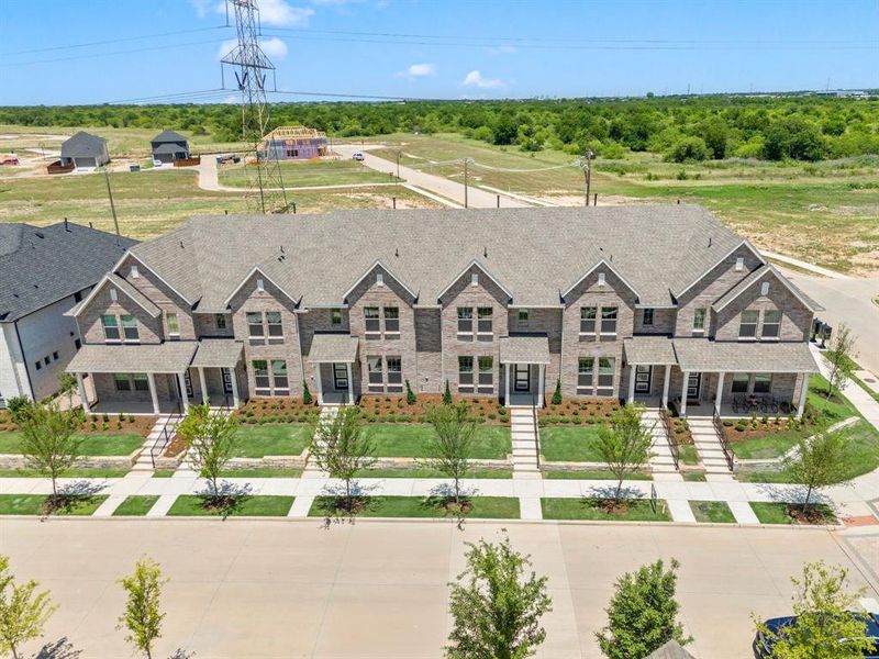 Front exterior of a new home in Karis, Crowley, TX, highlighting curb appeal (Image 2). Front exterior of a new home in Karis, Crowley, TX, highlighting curb appeal (Image 2).