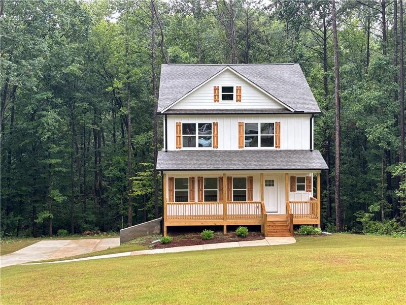 Front exterior of a new home in , Monticello, GA, highlighting curb appeal (Image 9).