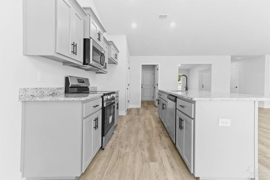 Furnished interior view inside a new home in Pecan Valley, Pensacola (Image 5).
