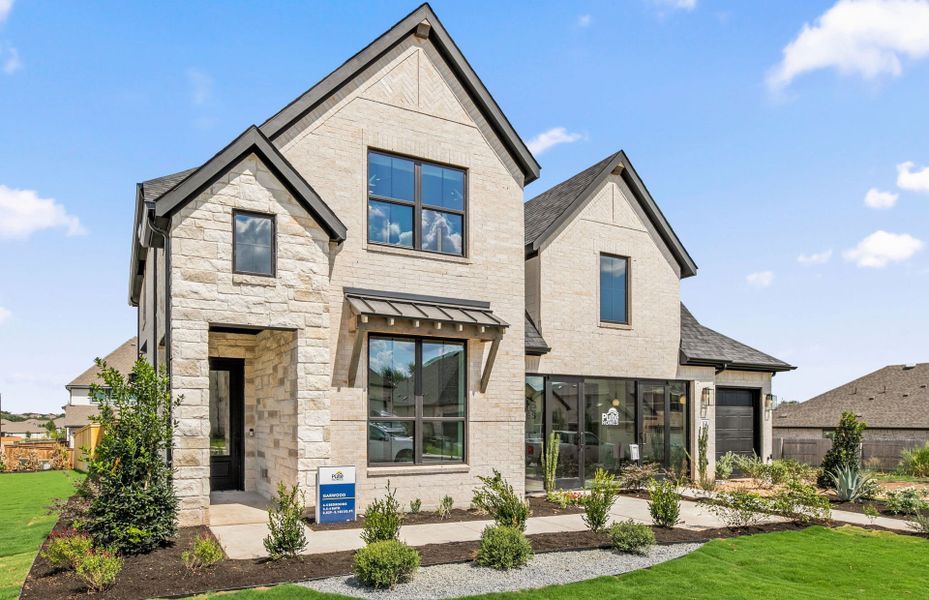 Representative exterior photo of a completed home built from the Garwood by Pulte Homes in Crescent Bluff, Georgetown, TX (Image 33). Representative exterior photo of a completed home built from the Garwood by Pulte Homes in Crescent Bluff, Georgetown, TX (Image 33).