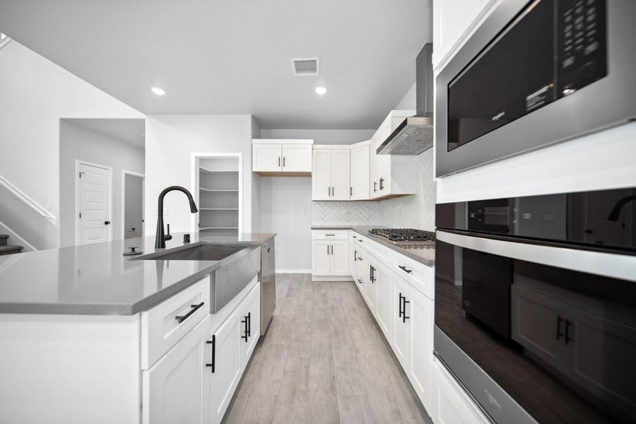 Representative furnished interior of a home built from the Capitan by Hakes Brothers in Summer Sky North, El Paso (Image 3).