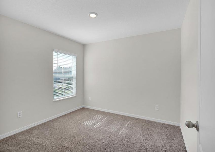 Each of the secondary bedrooms include tan carpets, closets and windows that let in plenty of bright, natural light Each of the secondary bedrooms include tan carpets, closets and windows that let in plenty of bright, natural light