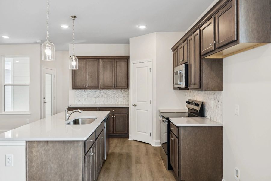 Furnished interior view inside a new home in Stewart's Glen | 55+ Community, Smyrna (Image 6). Furnished interior view inside a new home in Stewart's Glen | 55+ Community, Smyrna (Image 6).