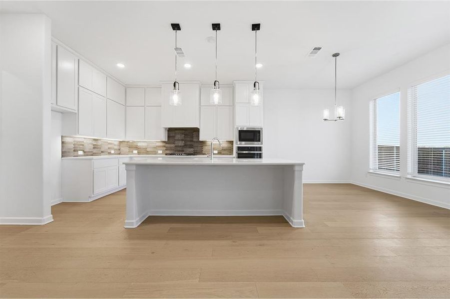 Furnished interior view inside a new home in Green Meadows, Celina (Image 4).