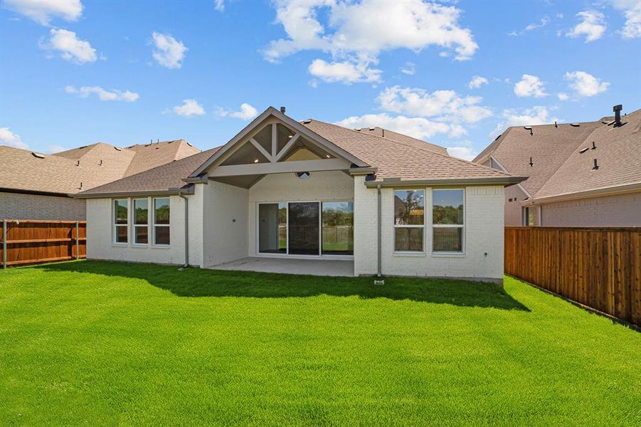 Exterior details and patio area of a home in Wellington, Haslet (Image 21).