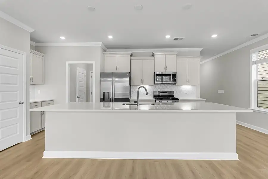 Furnished interior view inside a new home in Pineland Preserve, Summerville (Image 8).