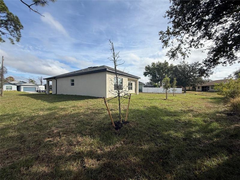 Exterior details and patio area of a home in , North Port (Image 23).
