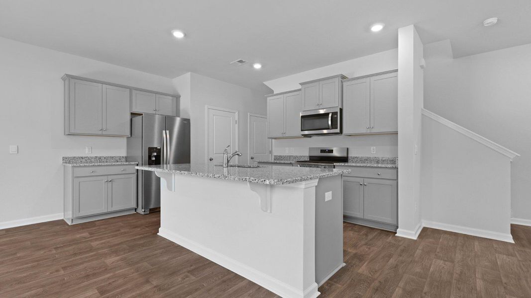 Furnished interior view inside a new home in Pine Hills at Cane Bay, Summerville (Image 4).