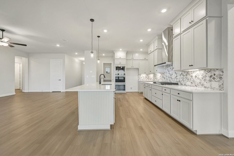 Furnished interior view inside a new home in Megans Landing – Half-Acre Homesites, Castroville (Image 14).
