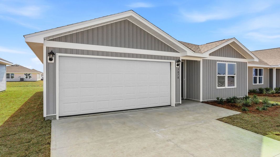 Front exterior of a new home in Liberty, Panama City, FL, highlighting curb appeal (Image 19).