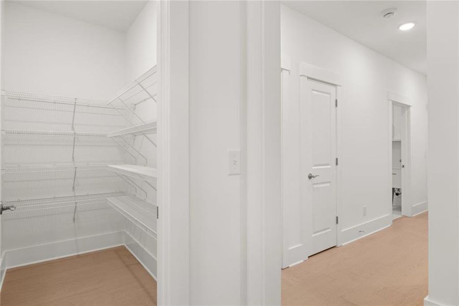 Spacious, unfurnished interior of a new home in Soleil Belmont Park, Canton (Image 48).