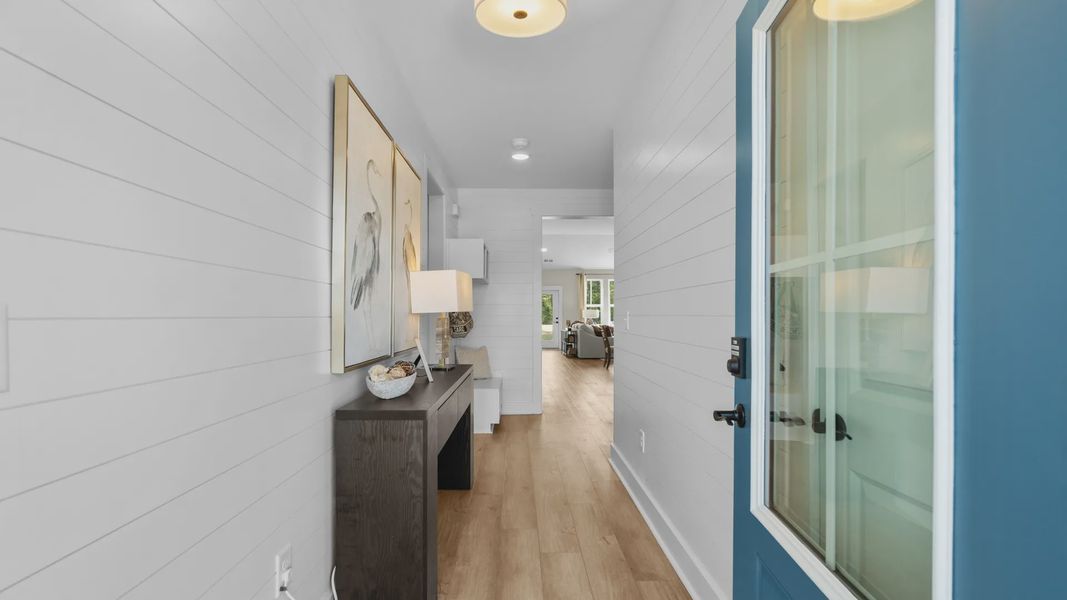 Welcoming entryway in the Summit home plan with stylish finishes and inviting design.
