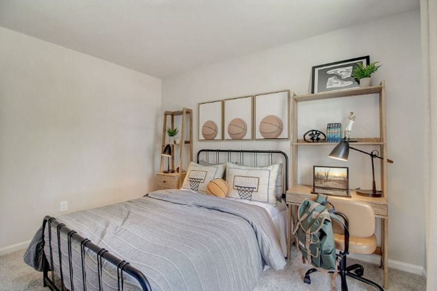 A bedroom with a bed and shelves. A bedroom with a bed and shelves.