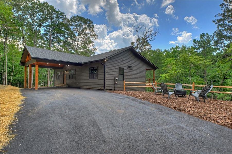 Exterior details and patio area of a home in , Ellijay (Image 29).
