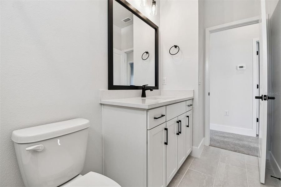 Furnished interior view inside a new home in Emerald Landing at Waterside at Lakewood Ranch – Cottage Series, Sarasota (Image 11).