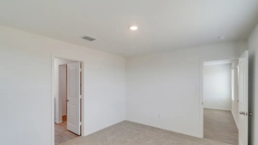 Representative unfurnished interior of a home built from the The Estero by D.R. Horton in Watermill, Uhland (Image 11).