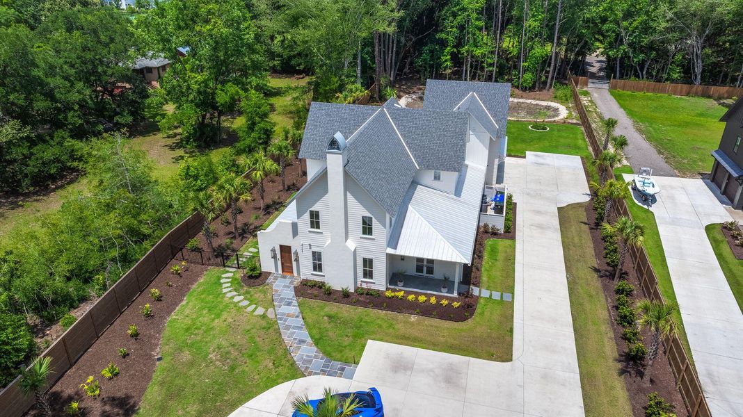 Front exterior of a new home in , Johns Island, SC, highlighting curb appeal (Image 31).