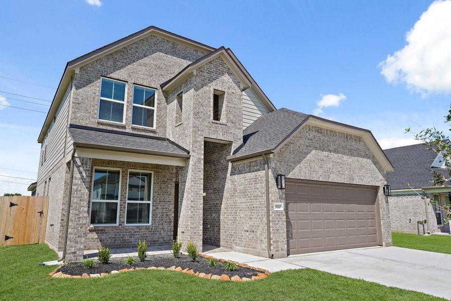 Front exterior of a new home in Briarwood Crossing, Rosenberg, TX, highlighting curb appeal (Image 18). Front exterior of a new home in Briarwood Crossing, Rosenberg, TX, highlighting curb appeal (Image 18).