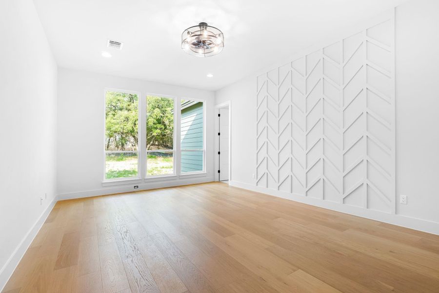 Unfurnished room featuring light hardwood / wood-style flooring Unfurnished room featuring light hardwood / wood-style flooring