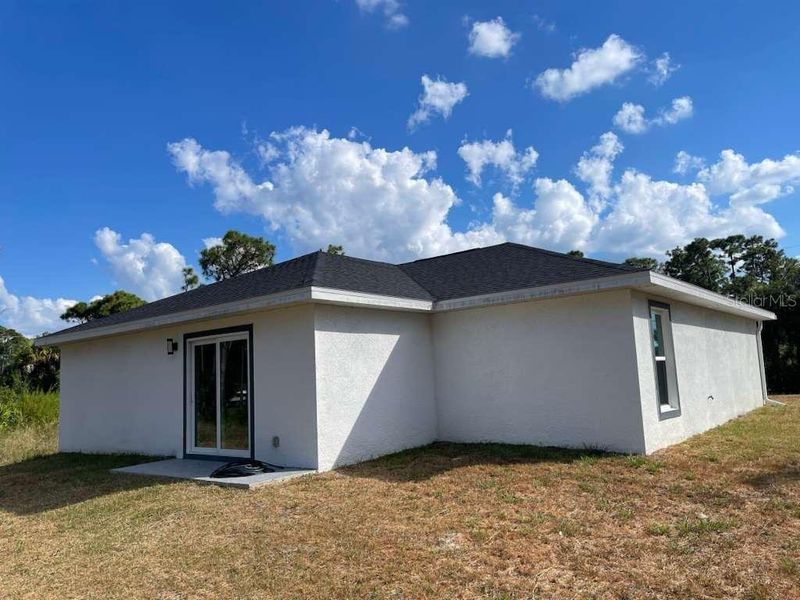 Exterior details and patio area of a home in , Port Charlotte (Image 10). Exterior details and patio area of a home in , Port Charlotte (Image 10).