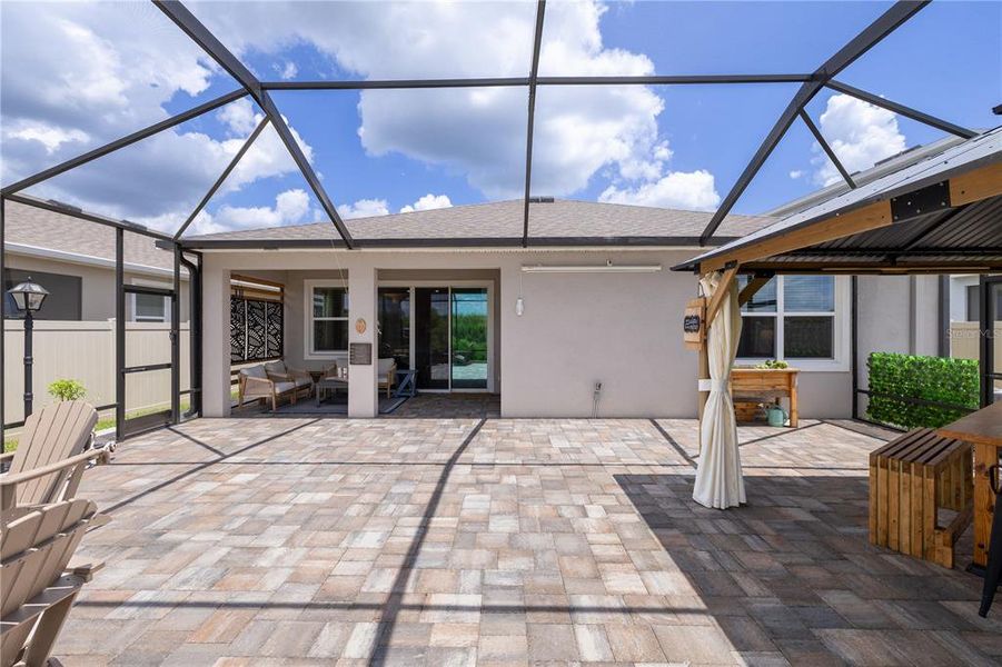 Exterior details and patio area of a home in Farm at Varrea, Plant City (Image 36).