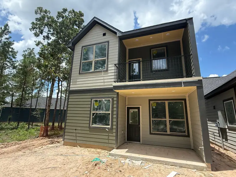Front exterior of a new home in Kresston, Montgomery, TX, highlighting curb appeal (Image 1). Front exterior of a new home in Kresston, Montgomery, TX, highlighting curb appeal (Image 1).