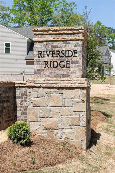 Front exterior of a new home in Riverside Ridge, Lawrenceville, GA, highlighting curb appeal (Image 21).