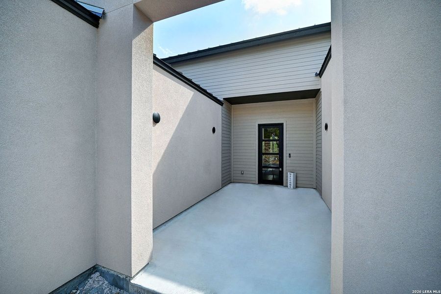 Exterior details and patio area of a home in , Fischer (Image 29).