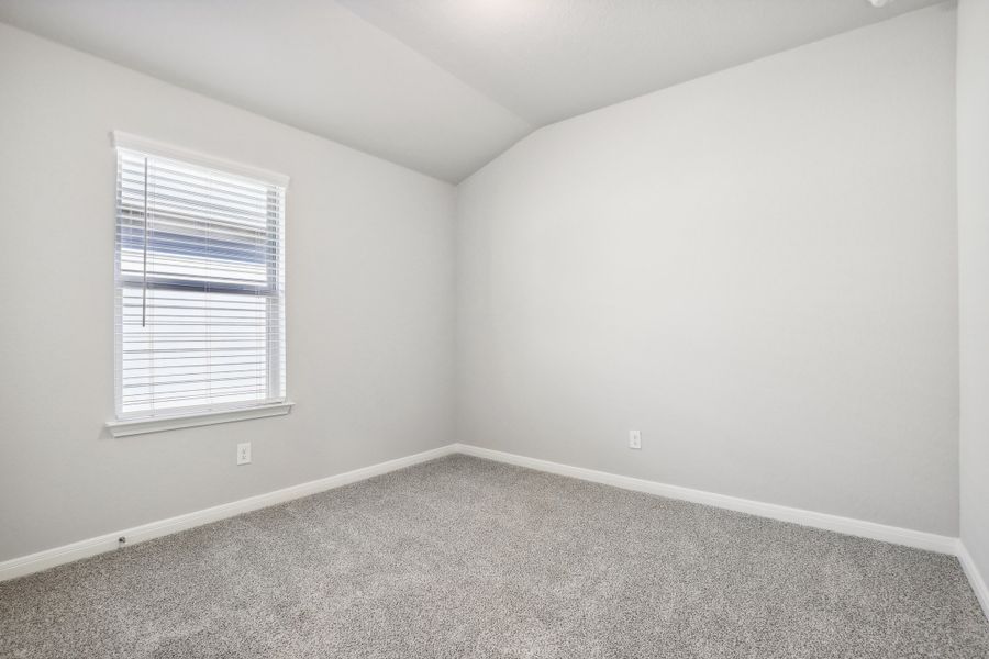 Guest bedroom in the Oleander floorplan at a Meritage Homes community. Guest bedroom in the Oleander floorplan at a Meritage Homes community.