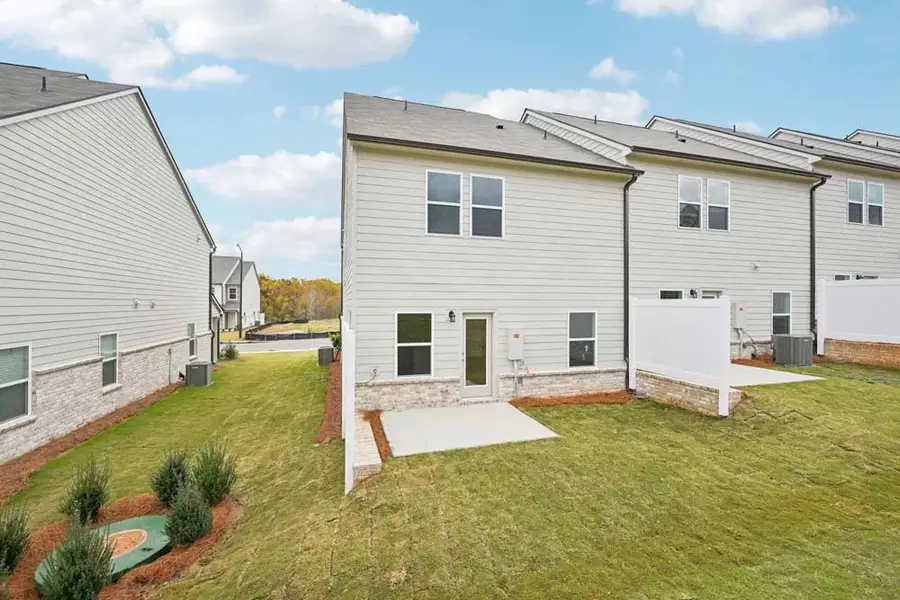 Sample Photo: Rear Exterior Featuring Private Patio