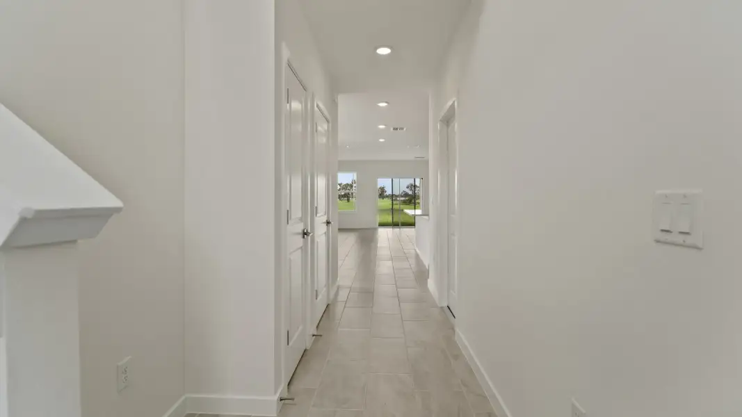 The Naples Entryway Hall Quick Move-In Home at Willowbrook North by DRB Homes in Winter Haven, FL