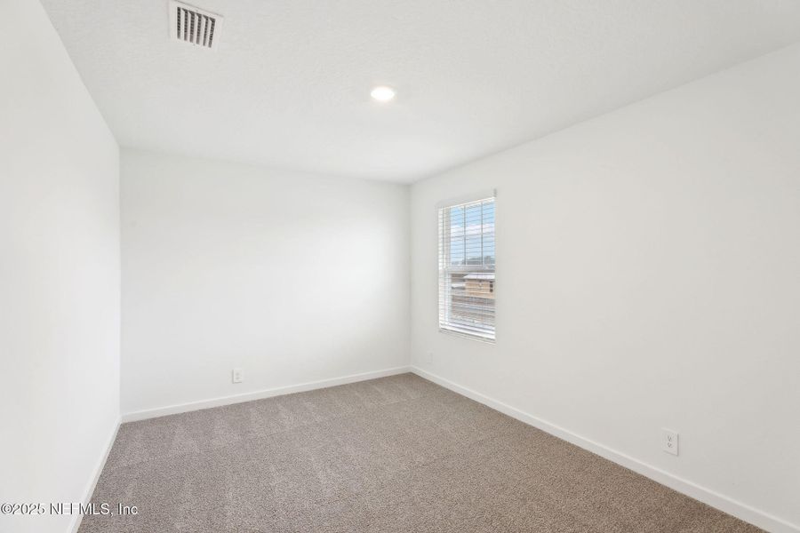 Spacious, unfurnished interior of a new home in Lakes at Bella Lago - Signature Series, Green Cove Springs (Image 34). Spacious, unfurnished interior of a new home in Lakes at Bella Lago - Signature Series, Green Cove Springs (Image 34).